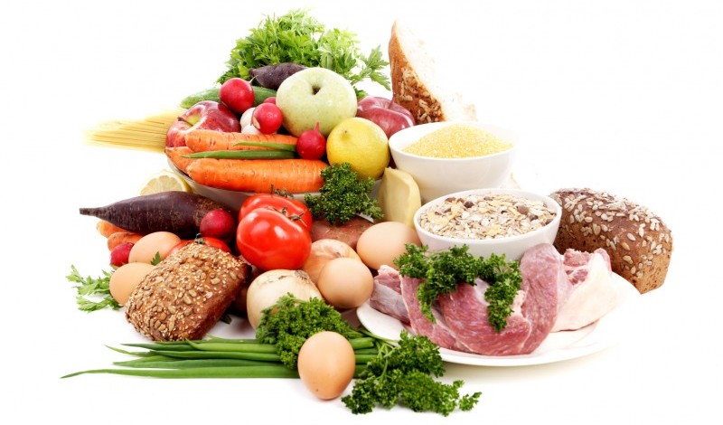 A selection of meat, fruit and vegetables containing protein