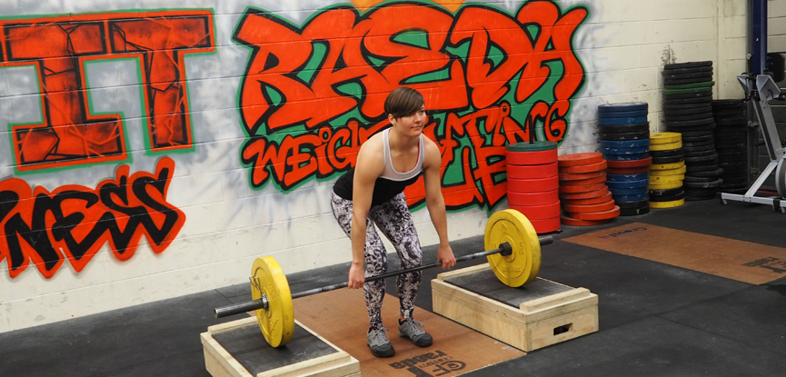 Fitness blogger Georgina demonstrates how to perform a rack pull deadlift