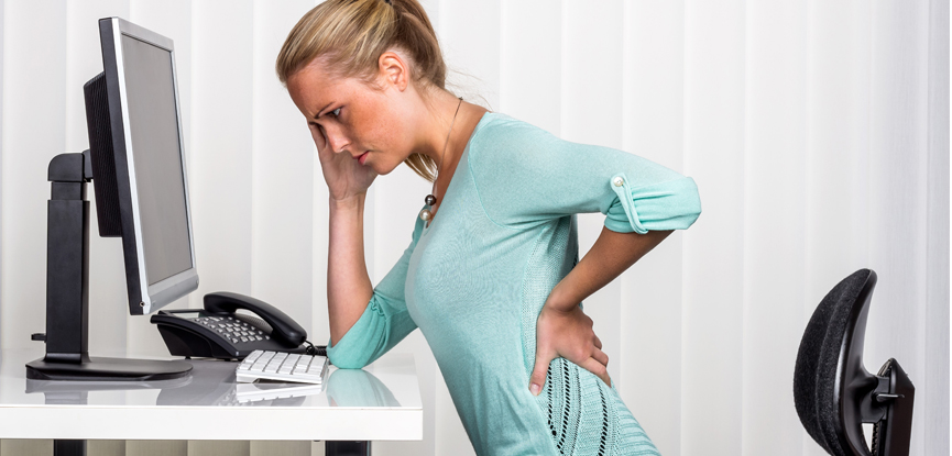 Low back pain can be caused by extended periods of sitting at the office