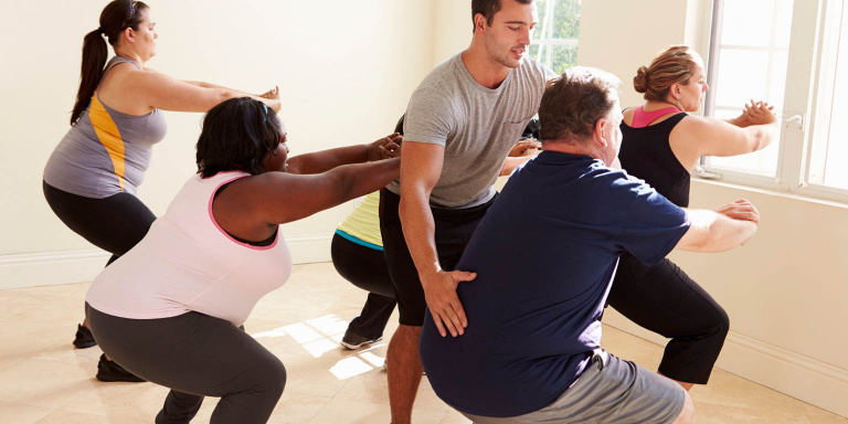 Group of overweight people exercising