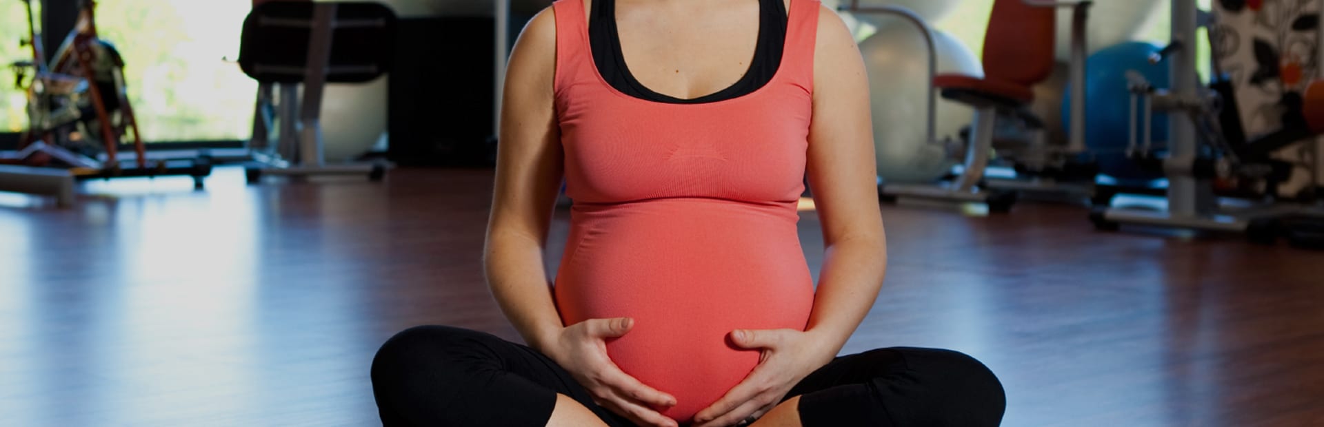 Pregnant client in an exercise studio