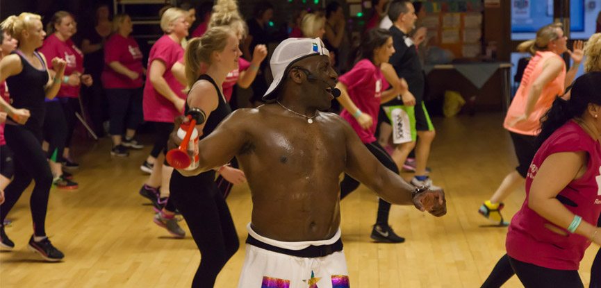 Kardy Laguda instructing an aerobics fitness class