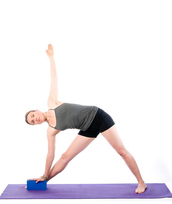 Sally Parkes performing the triangle yoga pose