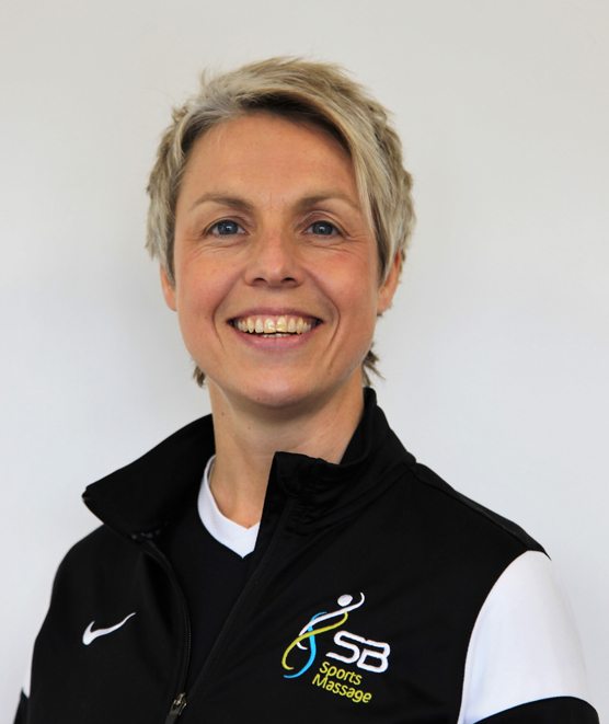 Sally Baker, a leading sports massage therapist, smiling