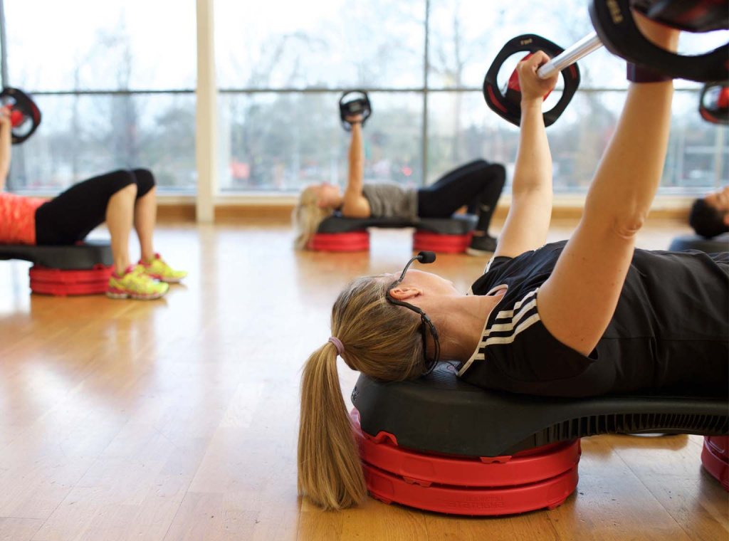 HFE ETM instructor leading studio strength class