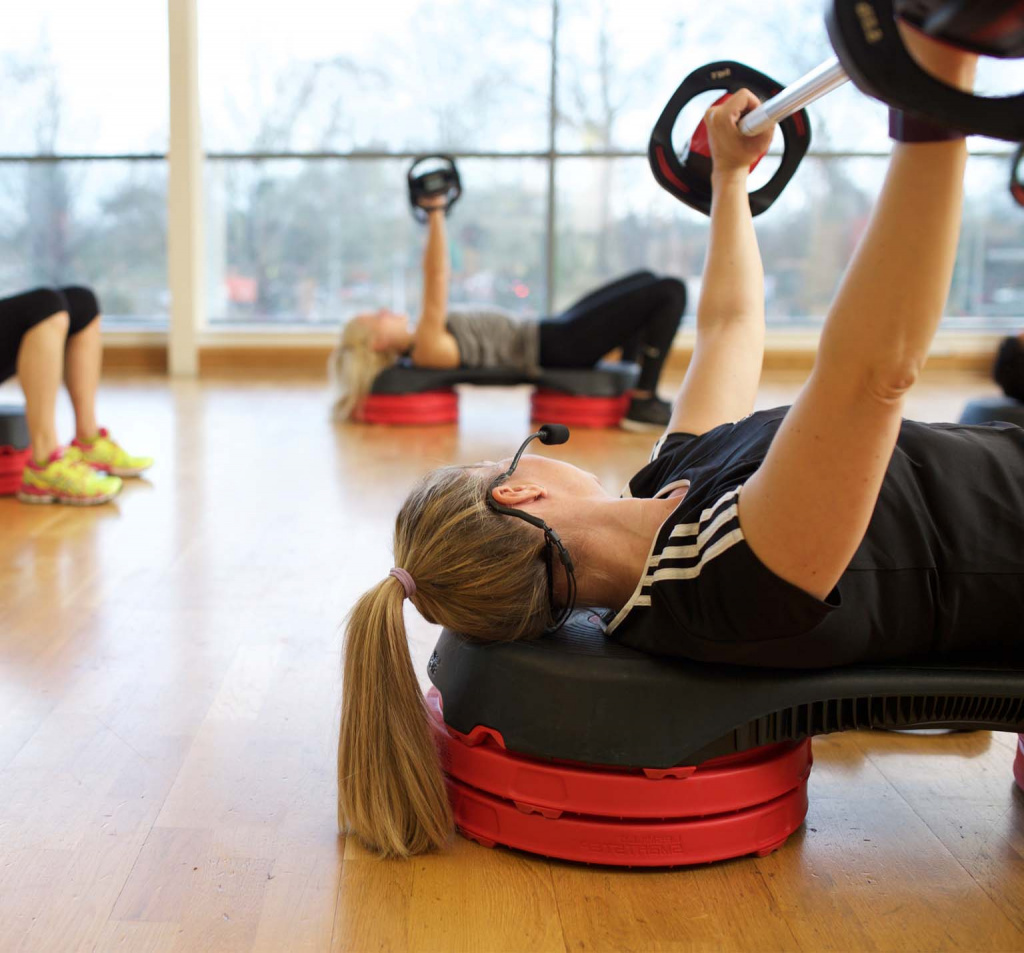 HFE ETM instructor leading studio strength class