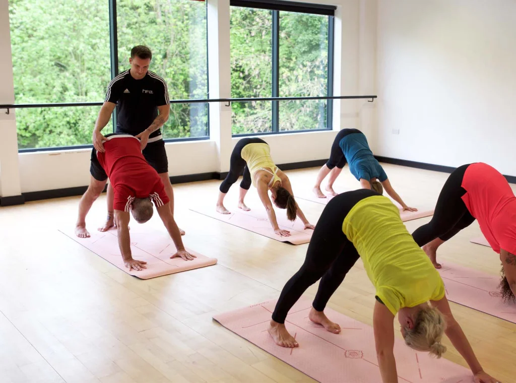 HFE yoga teacher leading class