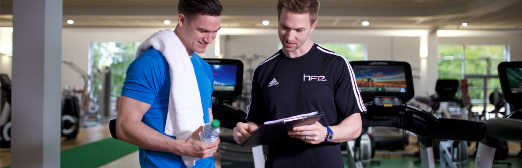 Employer personal trainers performing a range of roles including membership sales
