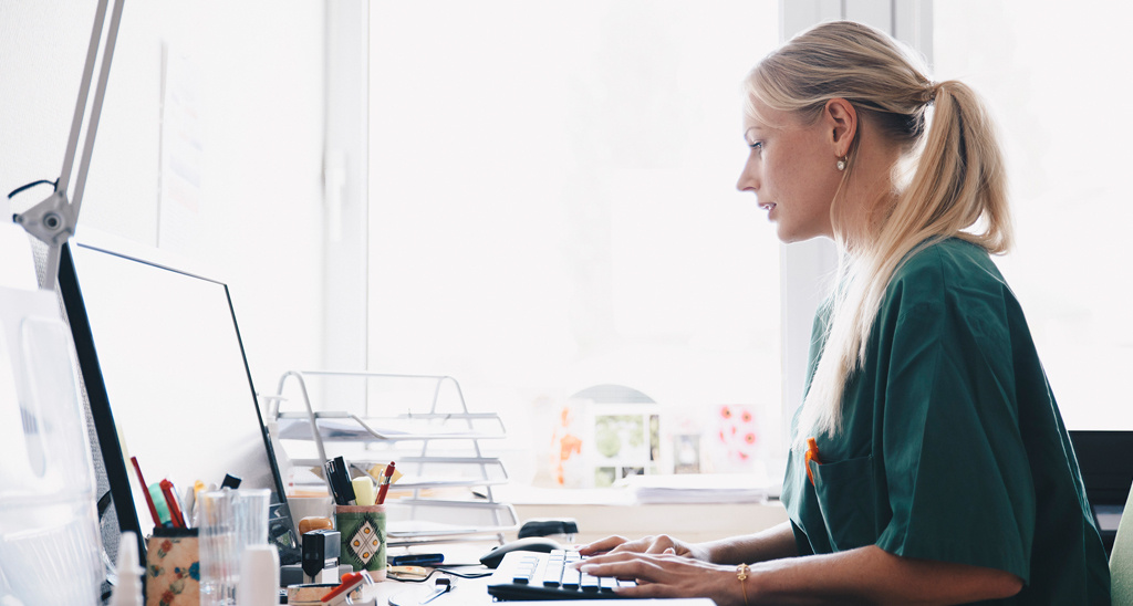 A woman at a desk in a modern office