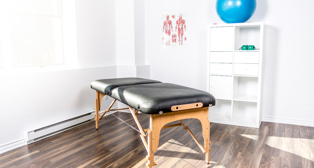 sports massage bed in a sunny room