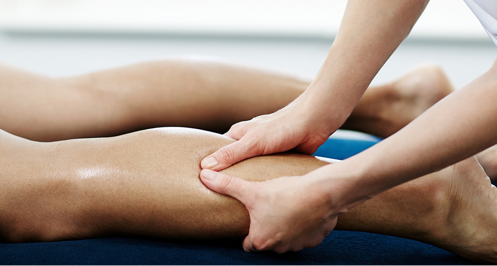 A sports massage treatment being performed with wax