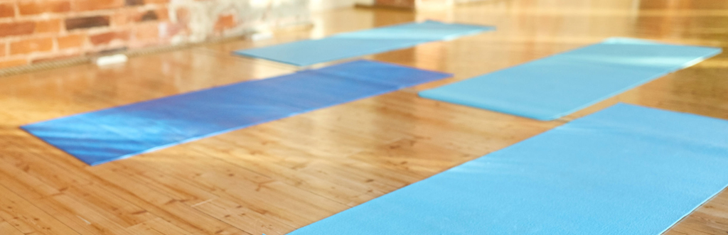 Mats in a group exercise studio