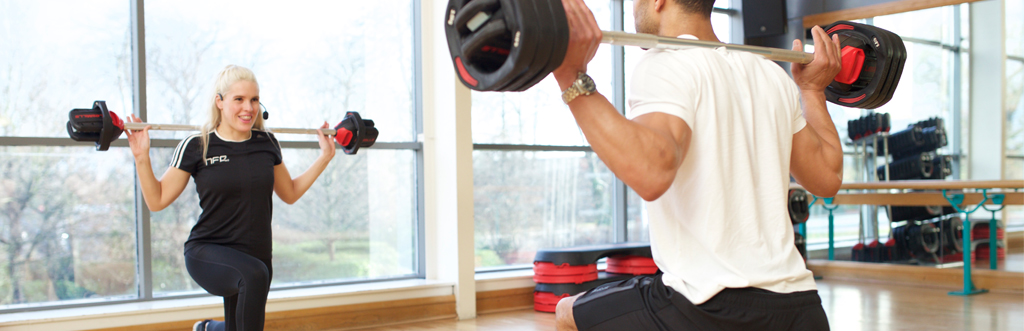 An ETM instructor leading a Les Mills class