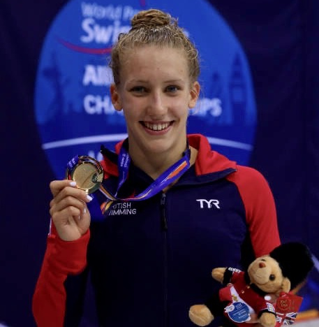 image of Louise Fiddess with gold medal