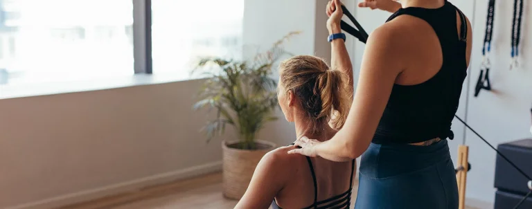 HFE tutor teaching reformer Pilates