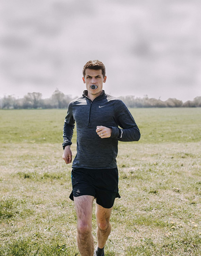 Man running with breathing device 