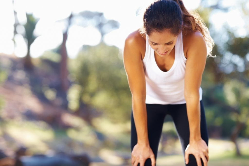 Woman out of breath from exercise