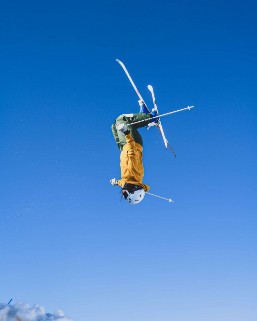 Backflip mogul skiing.