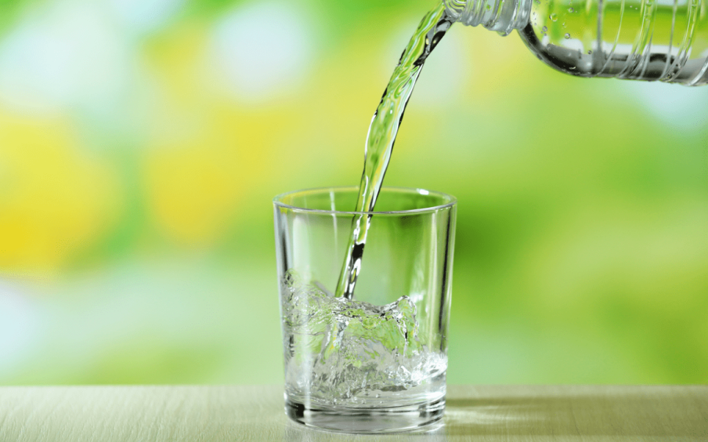 Pouring glass of water