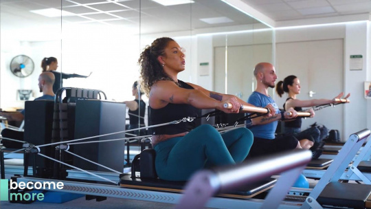 HFE student on Pilates reformer