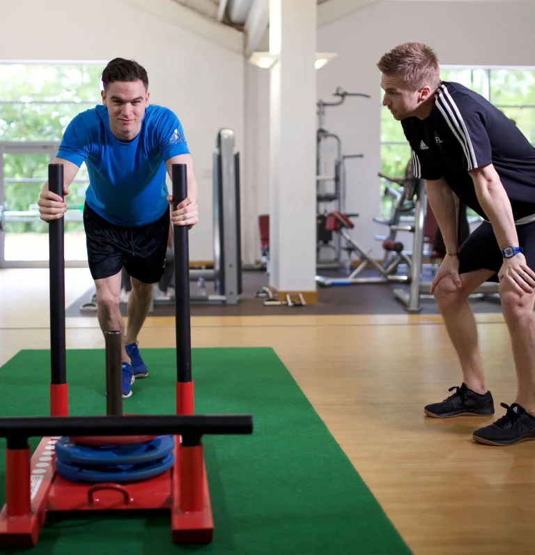 PT and client pushing a prowler