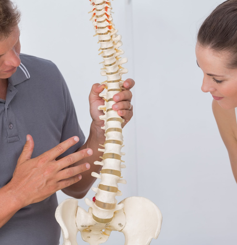 low back pain specialist with spine