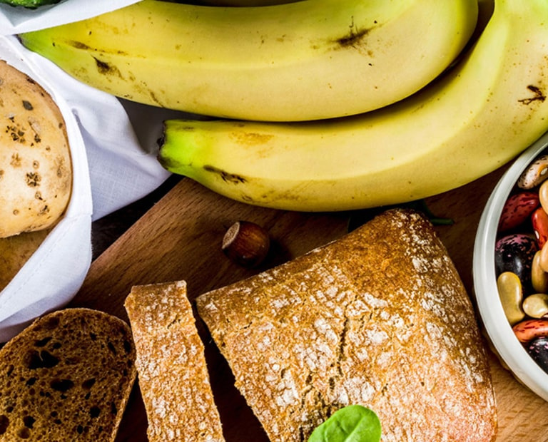 Range of different foods spread out on table