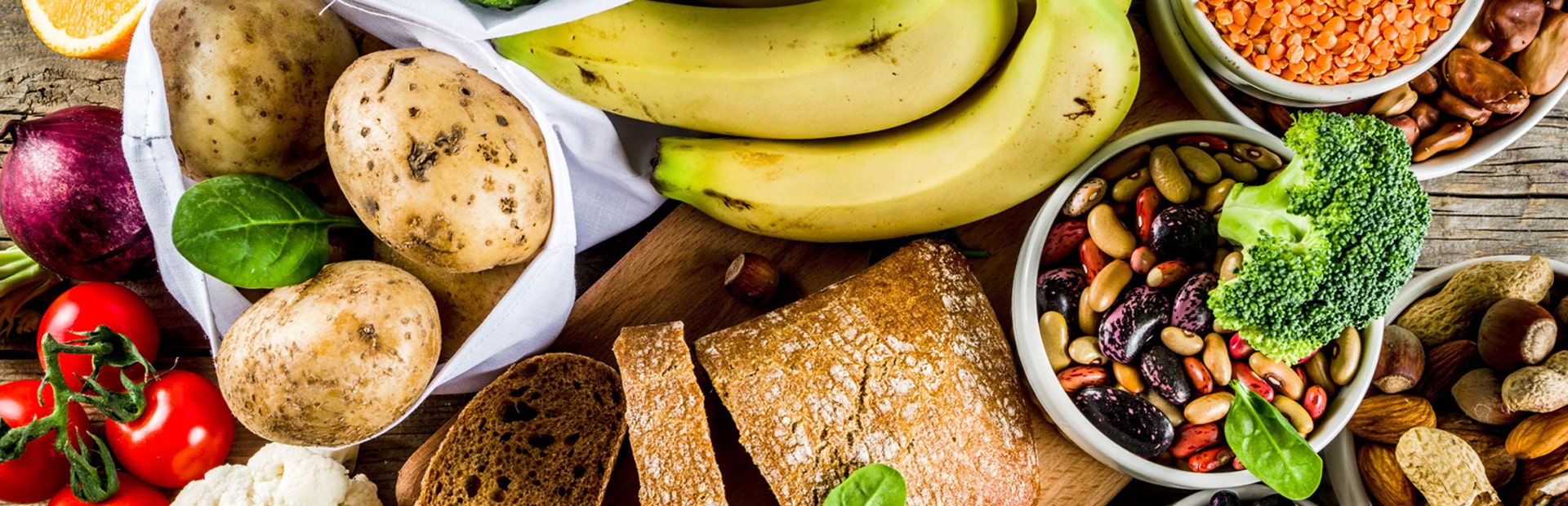 Range of different foods spread out on table