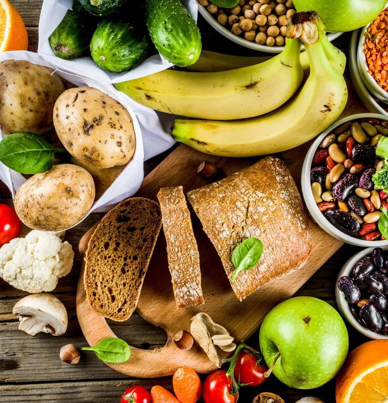 Range of different foods spread out on table