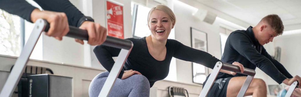HFE student on Pilates reformer