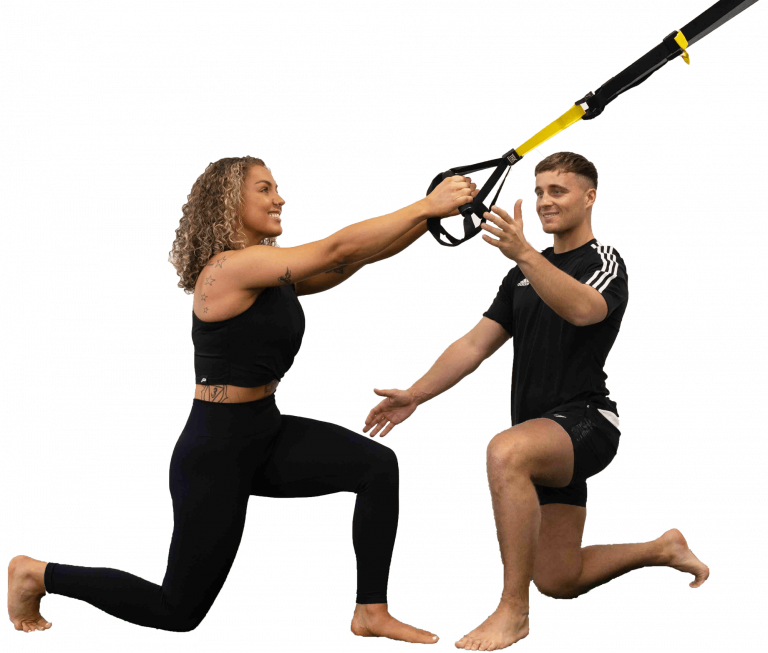 HFE instructor with client on TRX suspension