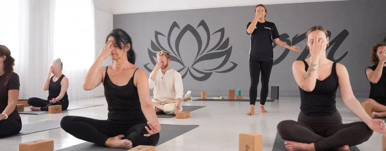 HFE yoga tutor delivering pranayama yogic breathing session
