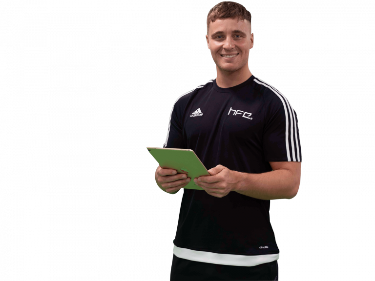 HFE tutor smiling holding iPad