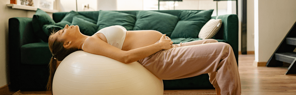 pregnany woman using exercise ball