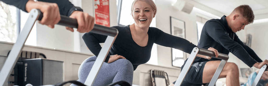 Pilates student on reformer