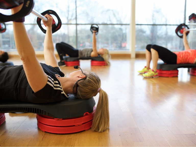 HFE teacher leading studio strength class