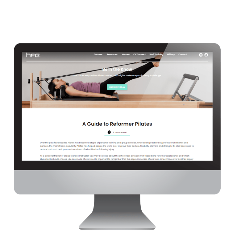 A guide to reformer Pilates article on a computer.