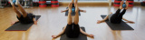 A Pilates class exercising