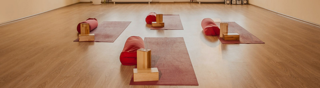 An exercise studio set up for yoga and Pilates classes.