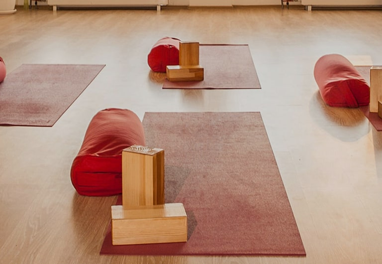An exercise studio set up for yoga and Pilates classes.