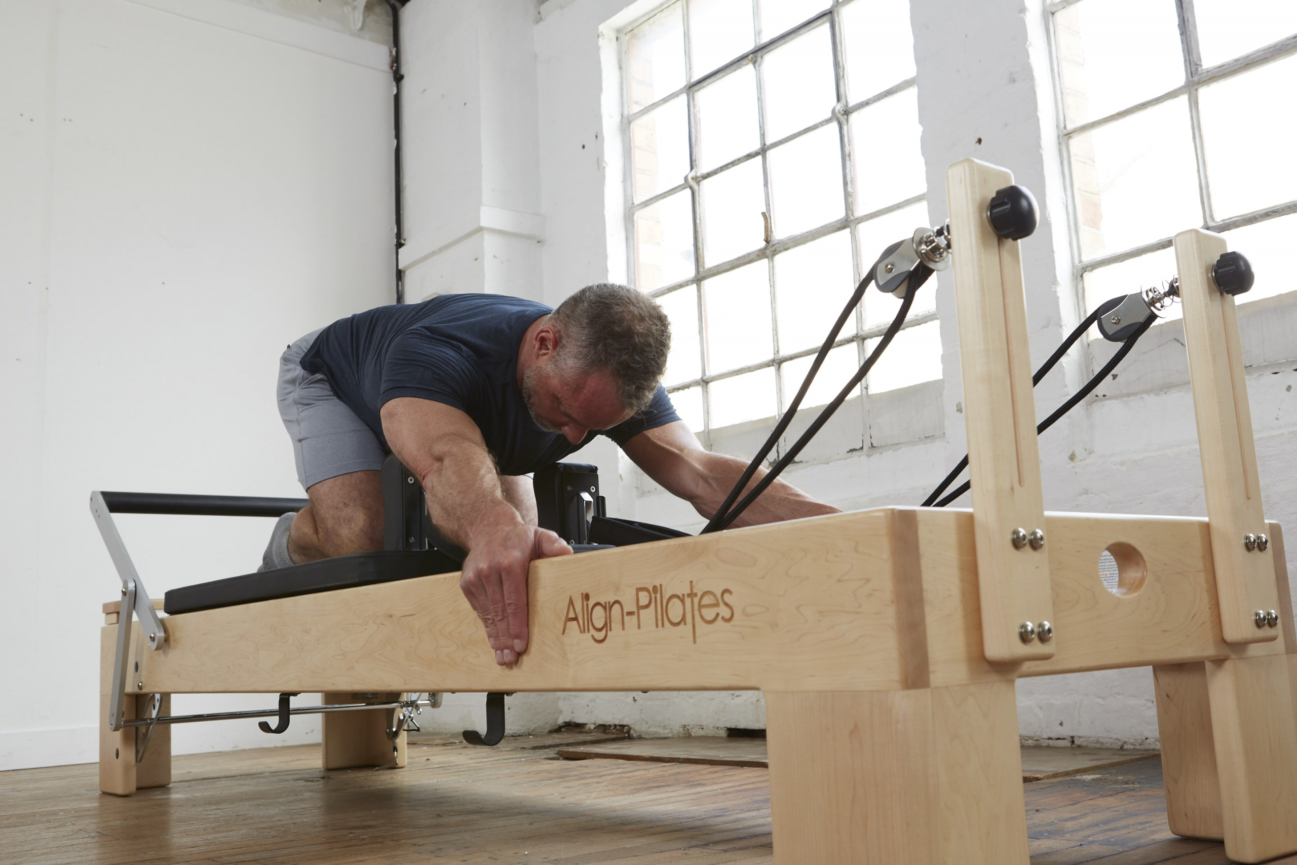 HFE Tutor on a Pilates reformer