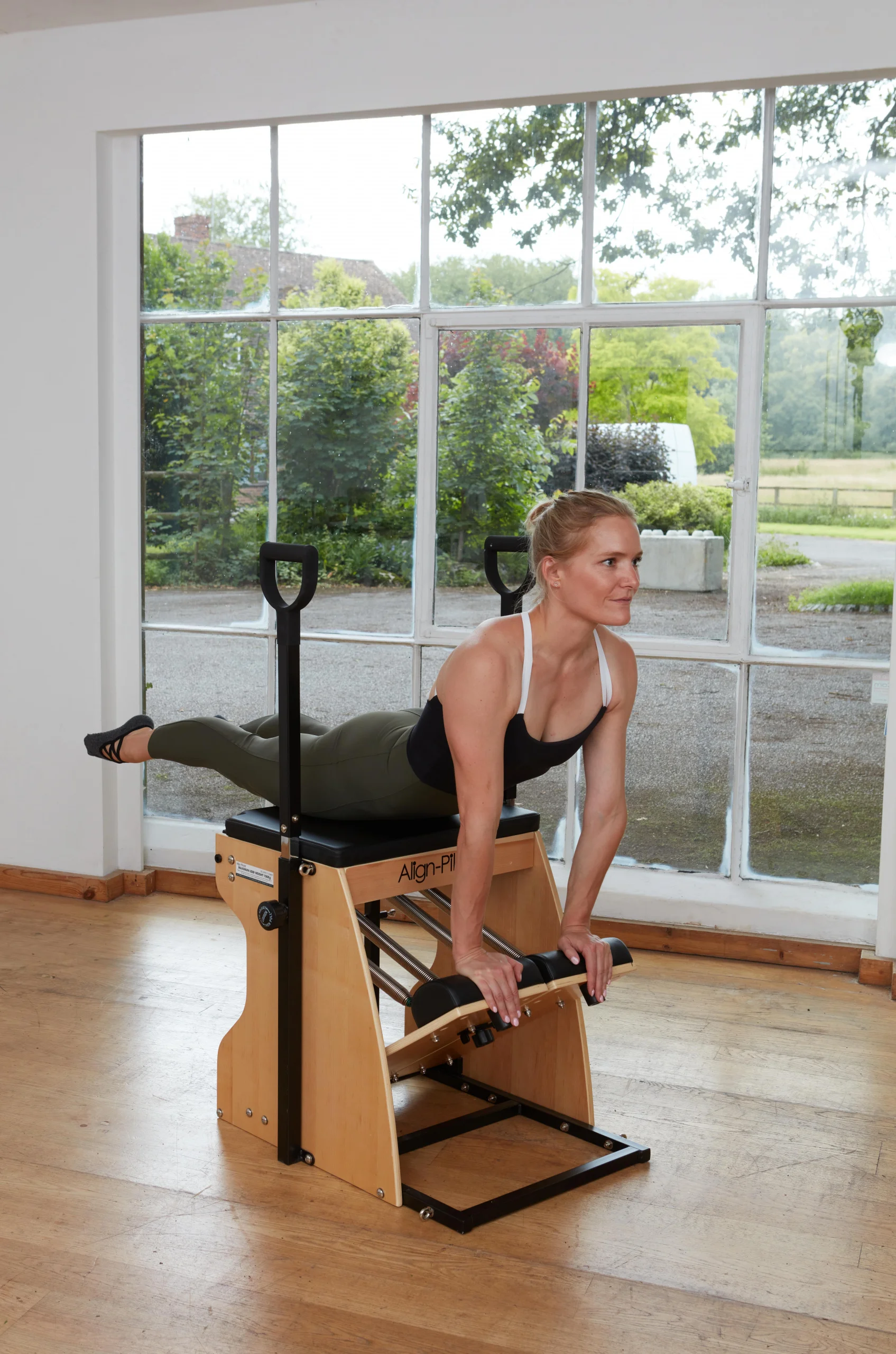 HFE Tutor on Pilates chair