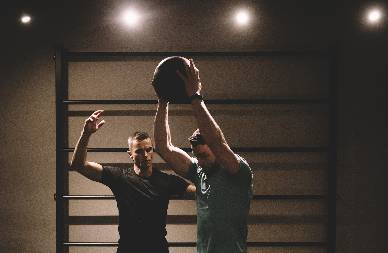 Matt Roberts training a client in the gym