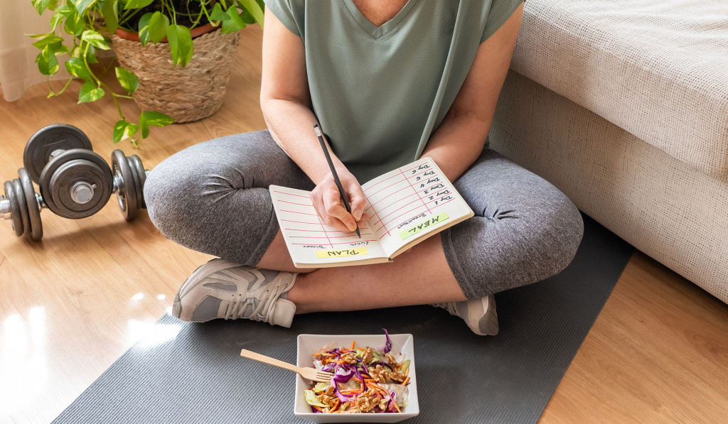 Fitness client planning her weight management meals