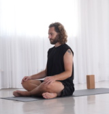 Man practising kundalini yoga class Man practising kundalini yoga class