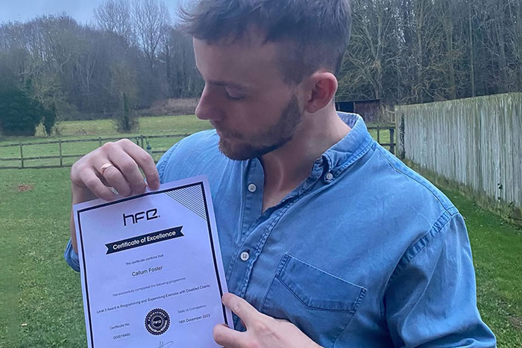 Callum Foster with his HFE certificate
