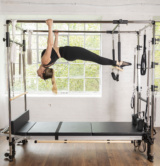 HFE student on Pilates equipment