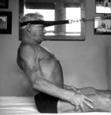 Joseph Pilates doing reformer