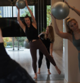 Pilates instructor teaching HFE students